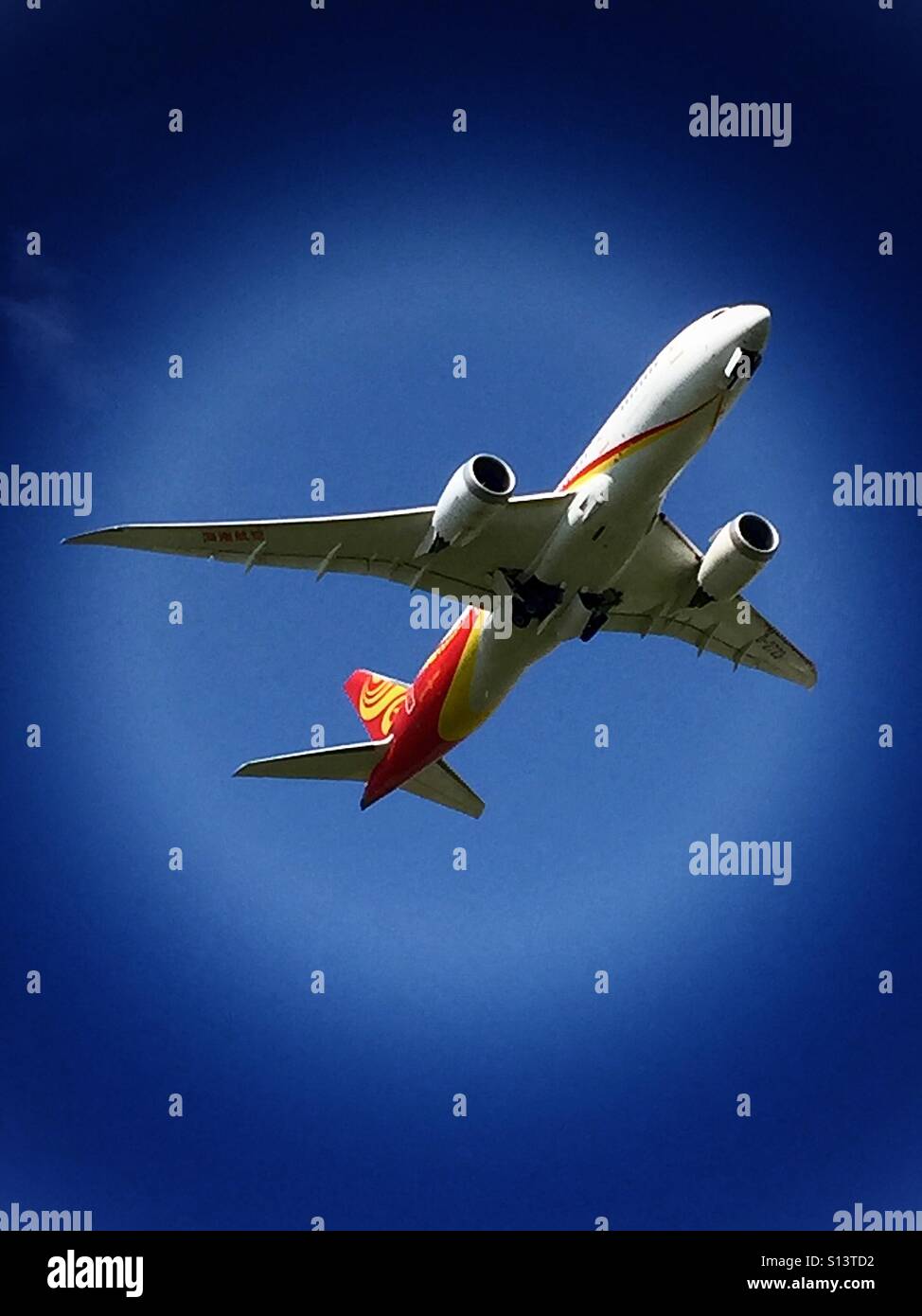 Red, white and yellow airliner - Smartphone Captured Stock Image