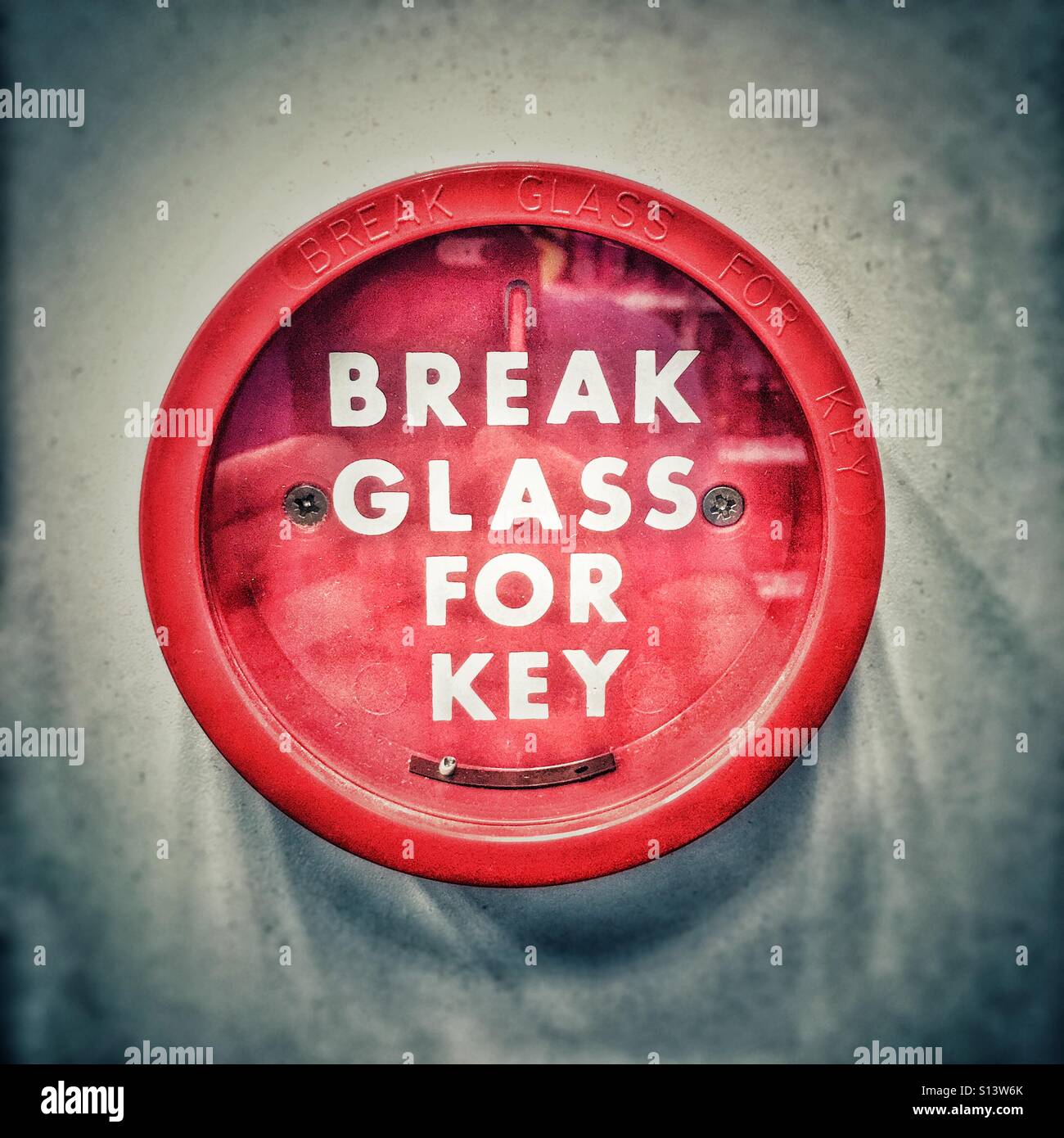 Emergency break glass for key Stock Photo