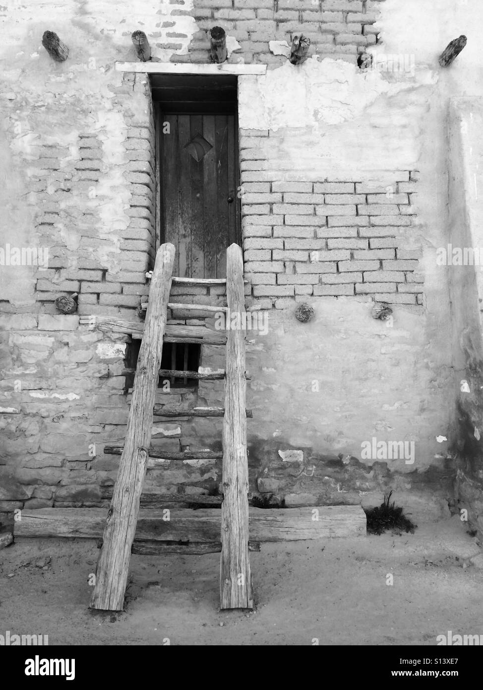 Detail of a ladder and wall in the old town of Acoma, New Mexico. Stock Photo