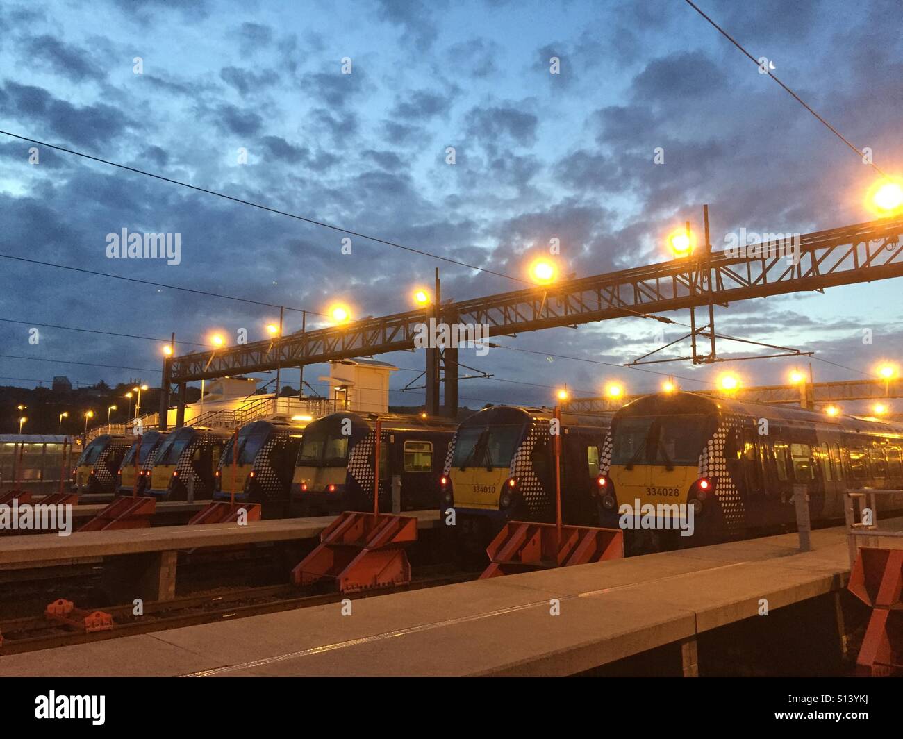 Trains in ScotRail Bathgate depot ready to leave the depot at 4:30am to work - Smartphone Captured Stock Image
