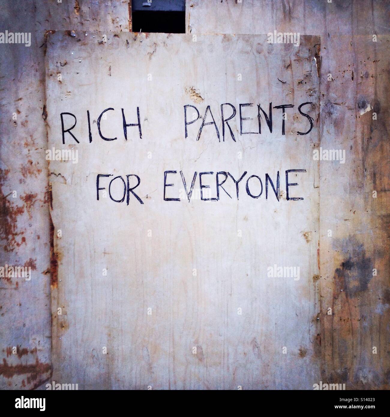 Rich Parents for Everyone Graffiti Stock Photo Alamy