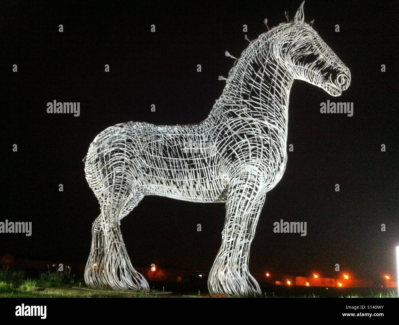 Heavy Horse Sculpture by Andy Scott at night, Easterhouse, Scotland Stock Photo