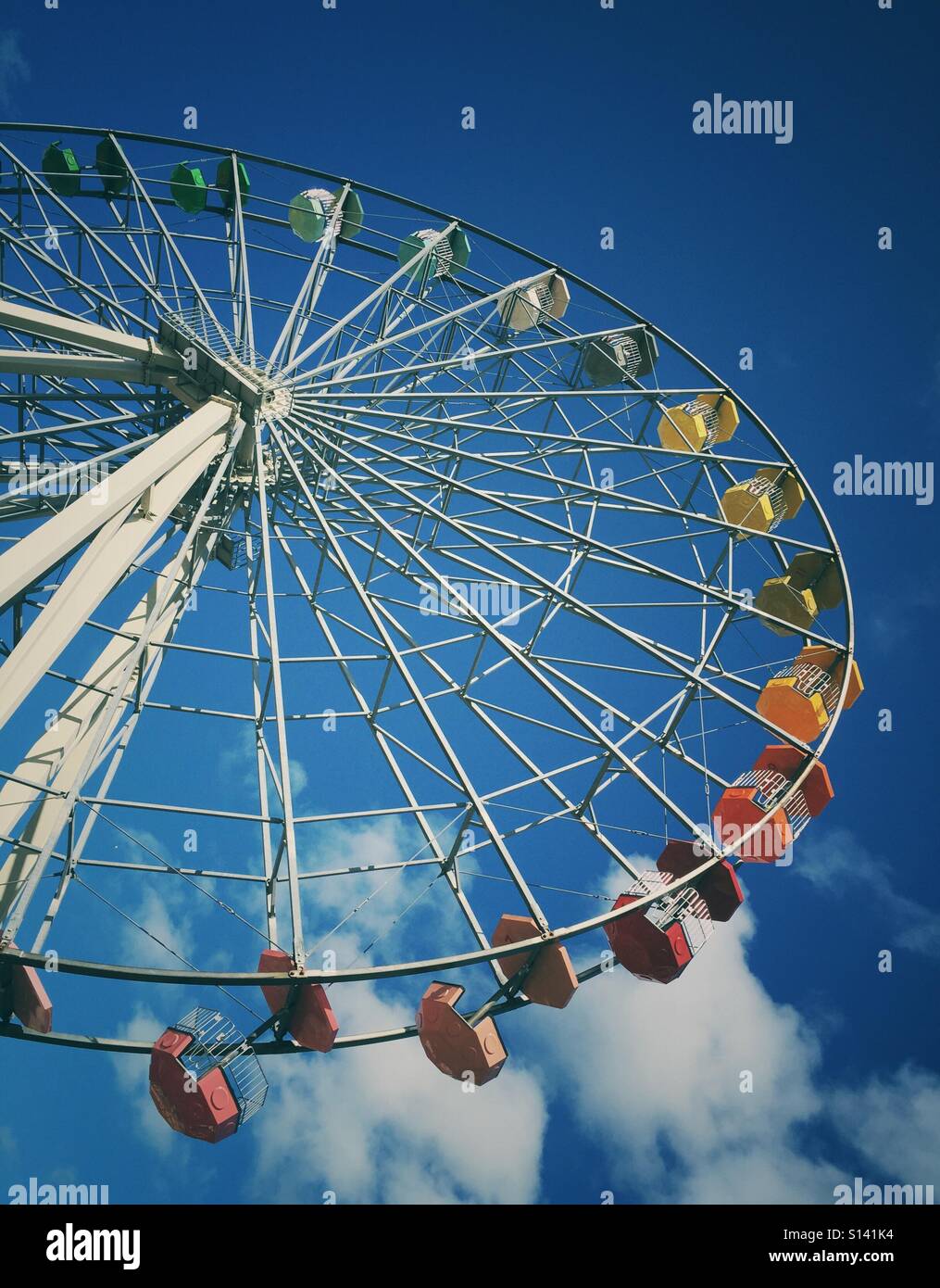 Ferris wheel against a blue summer sky - Smartphone Captured Stock Image