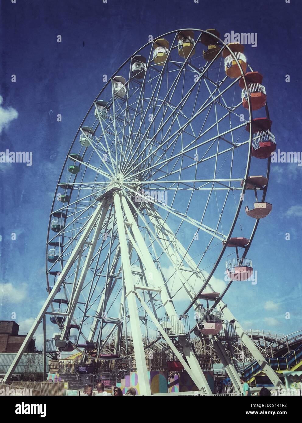 Ferris wheel against a blue summer sky - Smartphone Captured Stock Image