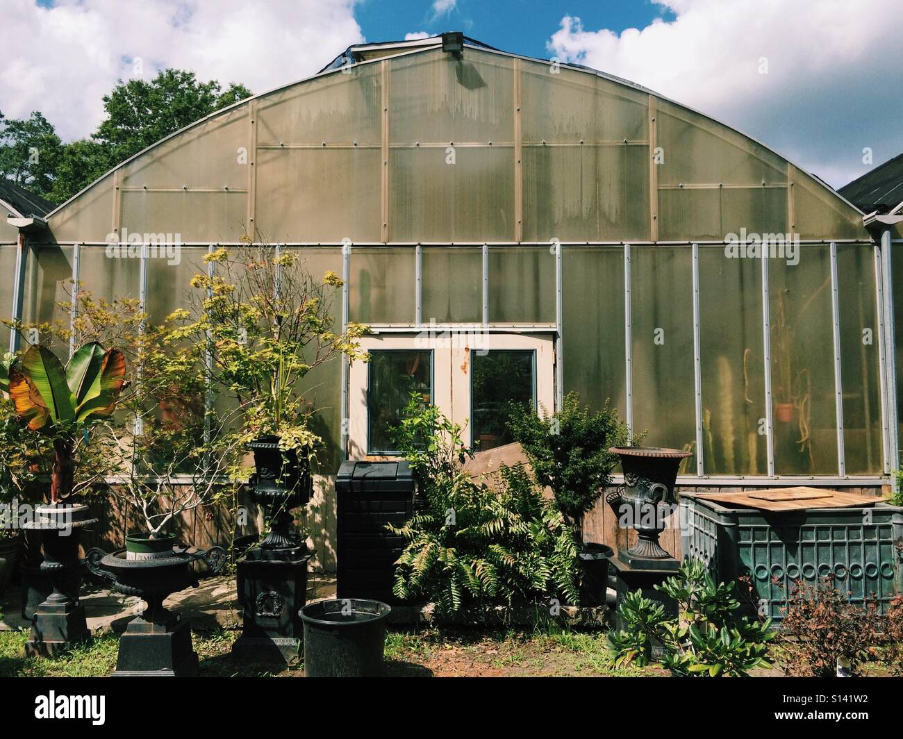 Exterior of a greenhouse at Old Hook Farm in New Jersey, USA. - Smartphone Captured Stock Image