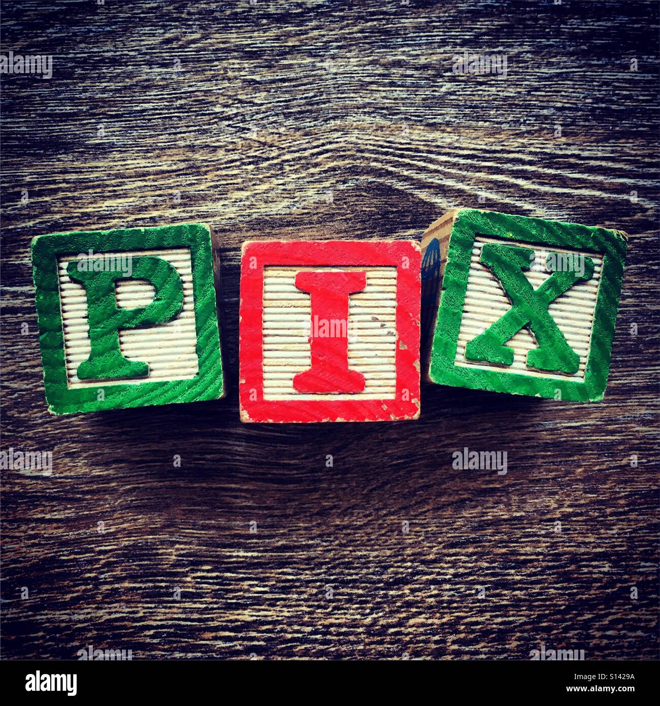 PIX word written with wood block letter toys - Smartphone Captured Stock Image