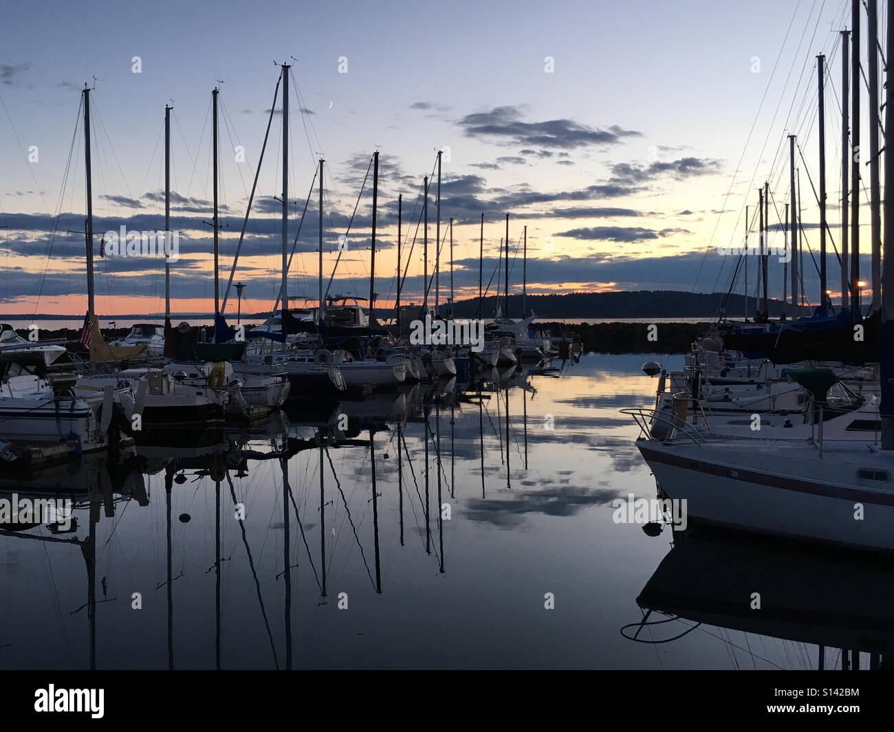 Peaceful Reflections of a late summer evening. Stock Photo