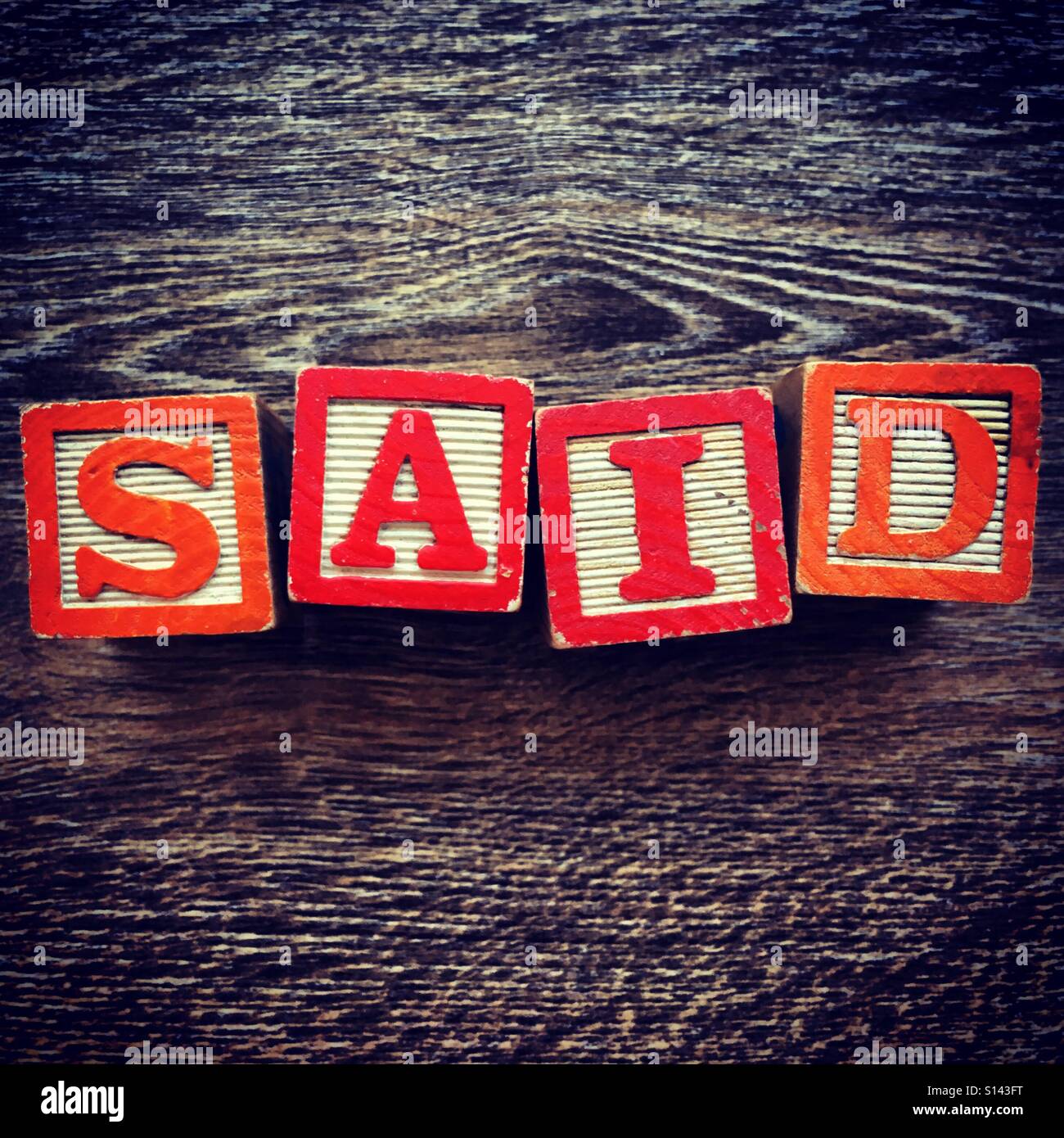 SAID word written with wood block letter toys - Smartphone Captured Stock Image