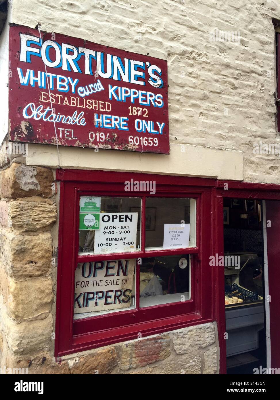 The famous 'Fortunes Whitby cured kippers' shop on Henrietta Street in Whitby, North Yorkshire, England. Stock Photo