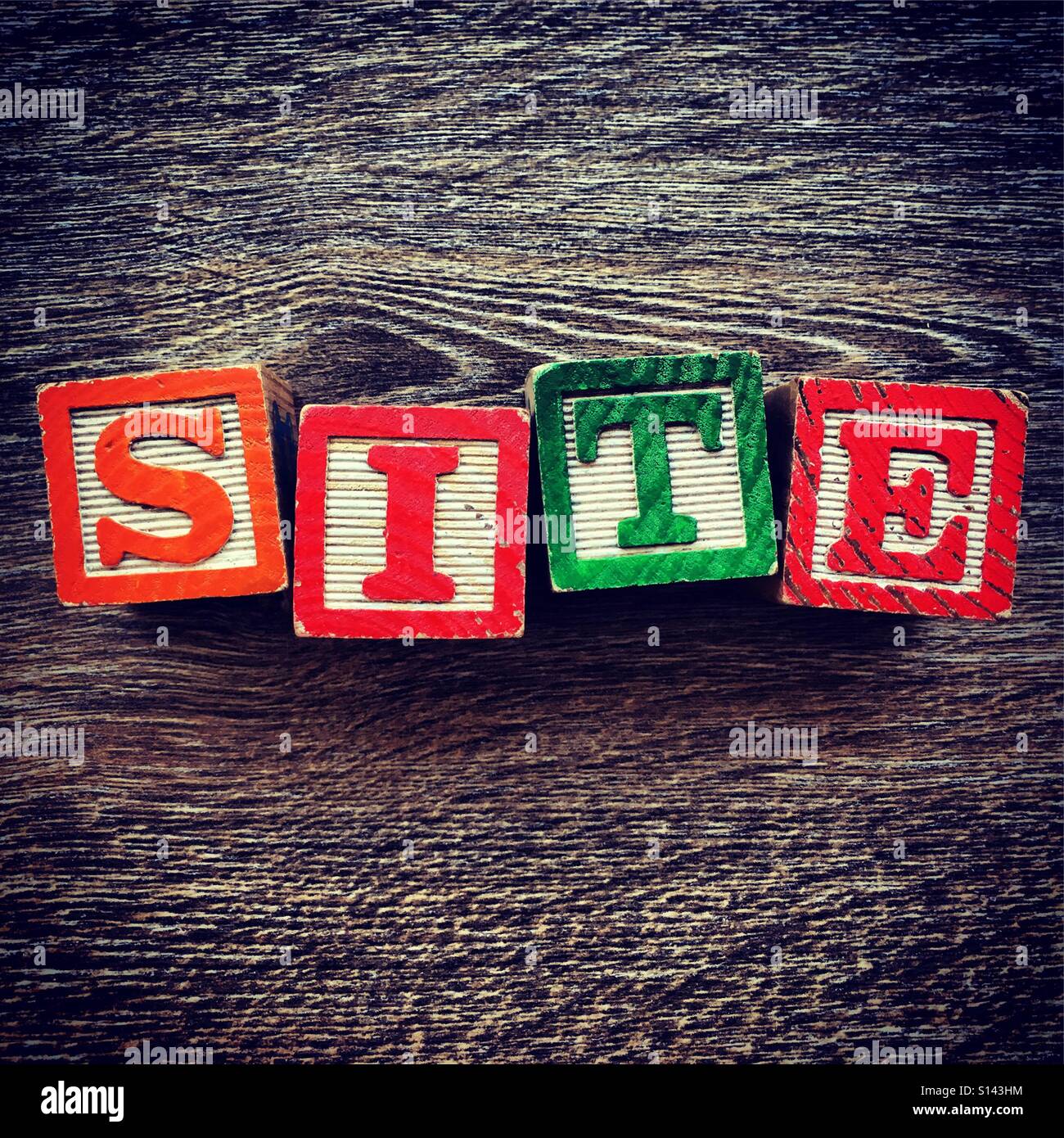 SITE word written with wood block letter toys - Smartphone Captured Stock Image