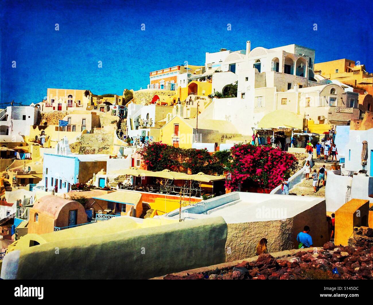 A view of buildings in the town of Oia on the Greek island of Santorini. - Smartphone Captured Stock Image