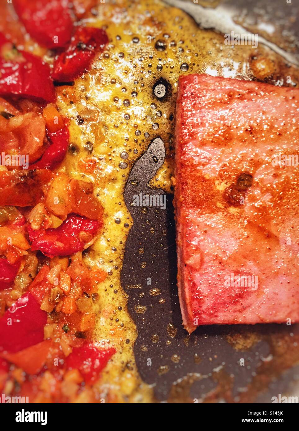 Red tuna and vegetables in coconut oil - Smartphone Captured Stock Image