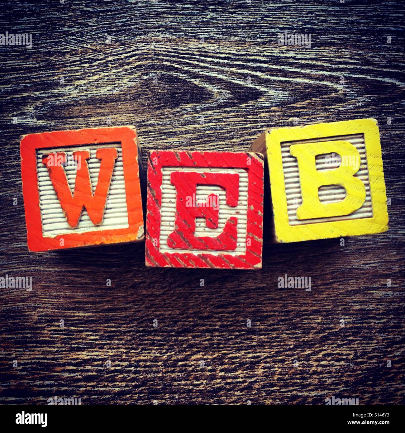 WEB word written with wood block characters - Smartphone Captured Stock Image