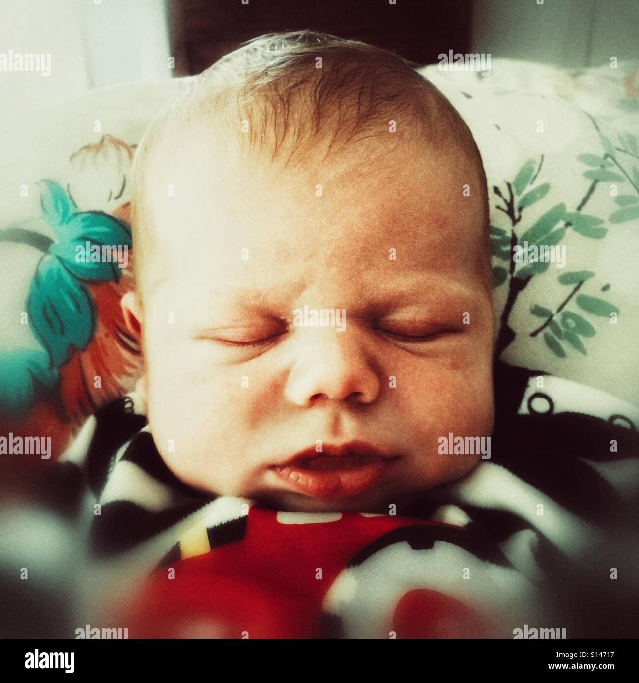 Two week old baby boy sleeping - Smartphone Captured Stock Image
