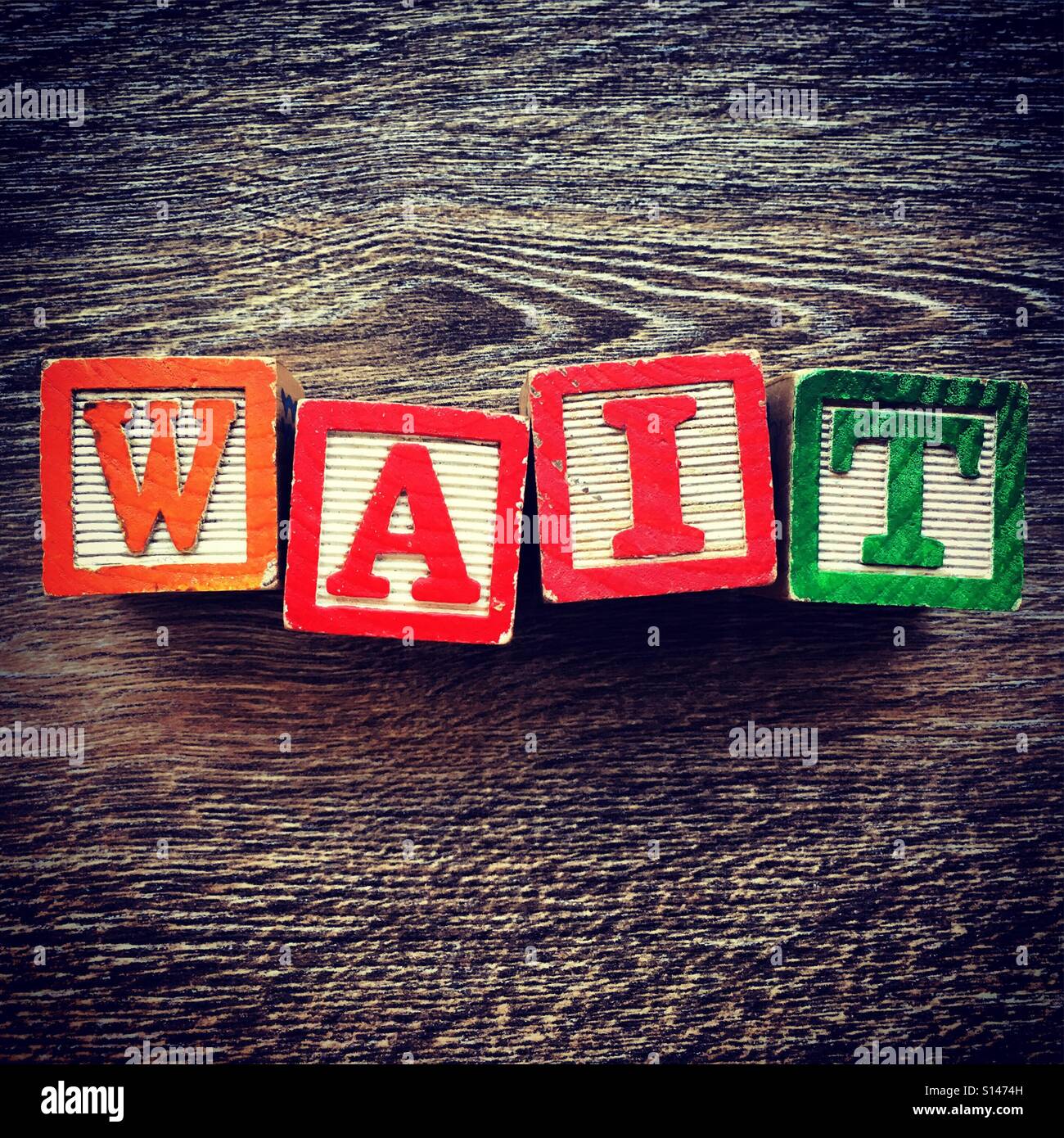 WAIT word written with wood block characters Stock Photo Alamy