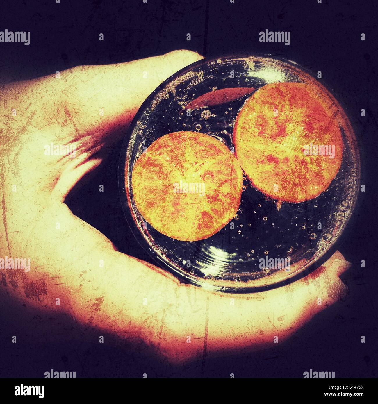 Woman holding a cold drink, close up of hand - Smartphone Captured Stock Image