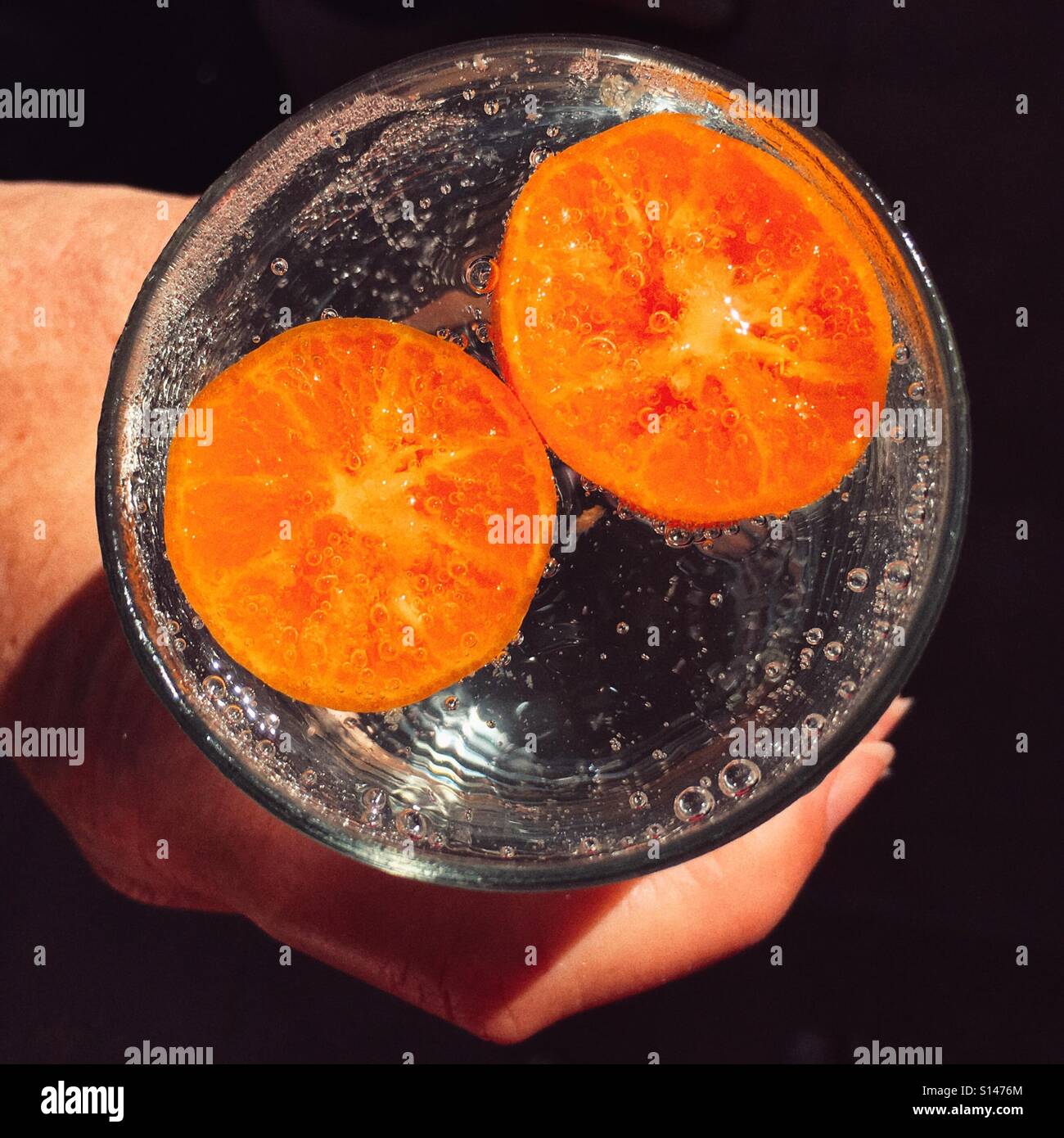 Woman holding a cold drink - Smartphone Captured Stock Image