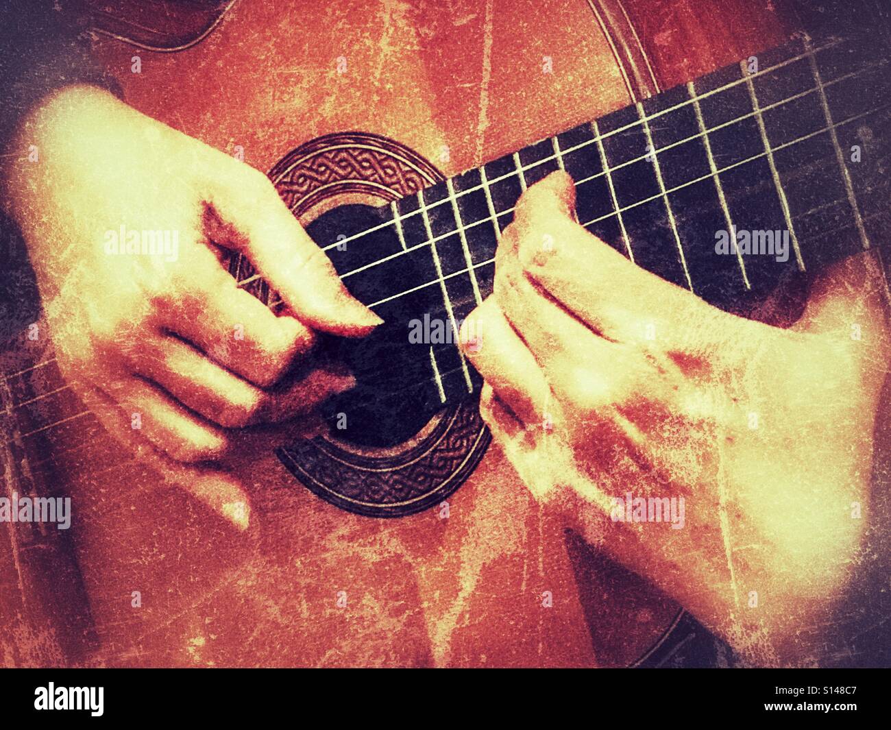 Woman playing a Greg Smallman & Sons guitar - Smartphone Captured Stock Image