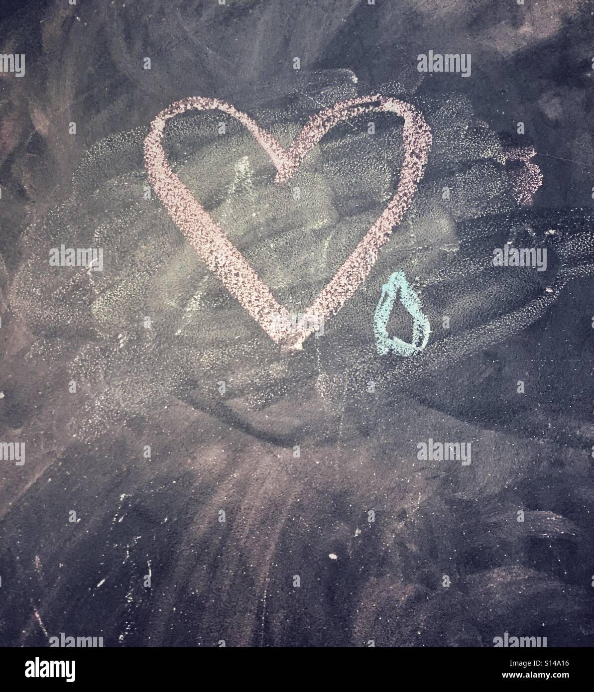 Chalk heart with teardrop Stock Photo