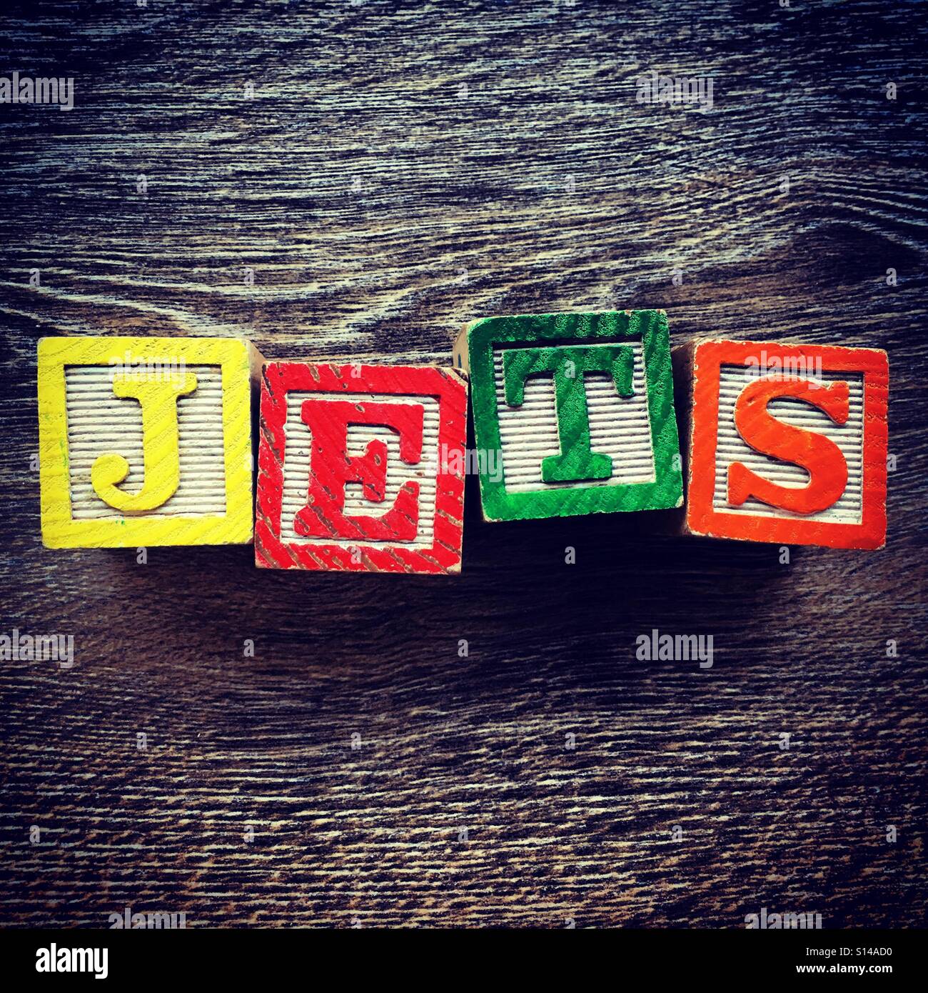 JETS word written with wood block characters - Smartphone Captured Stock Image