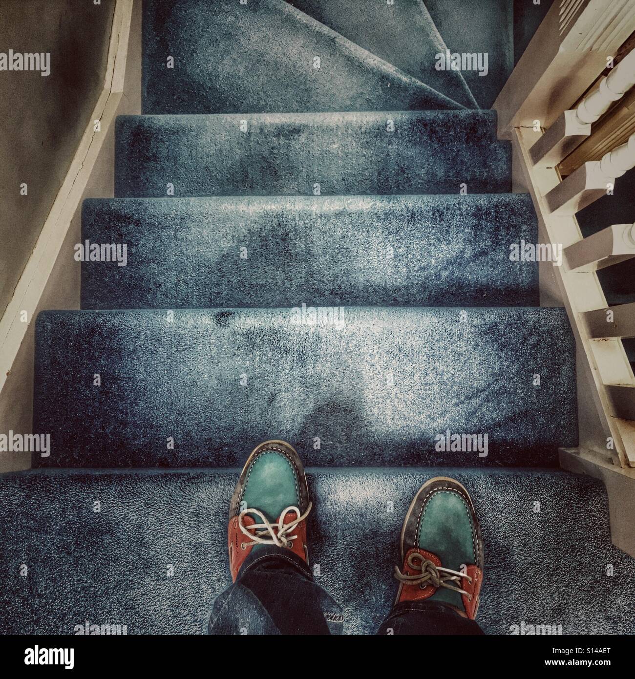 POV walking down stairs Stock Photo