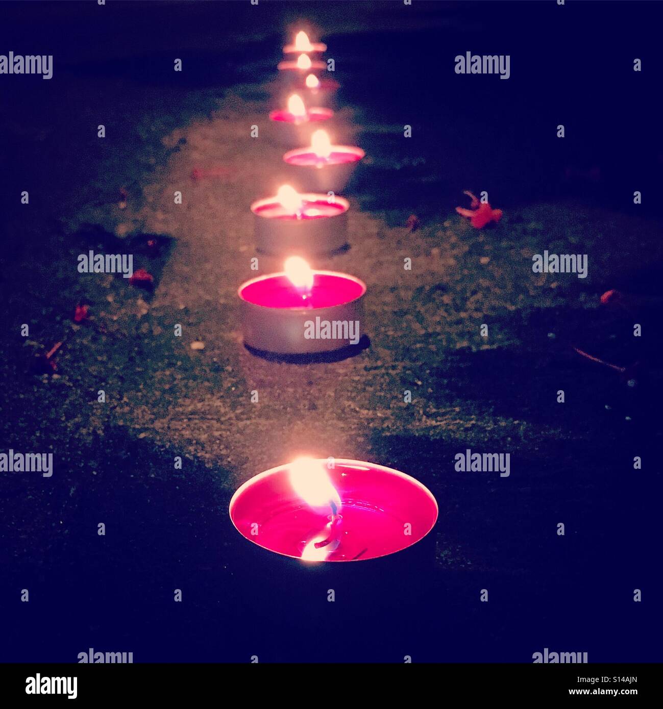 range of red candles - Smartphone Captured Stock Image