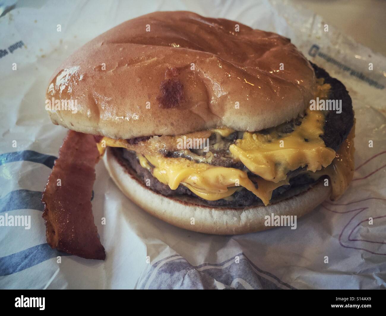 Triple cheeseburger Macdonalds France - Smartphone Captured Stock Image