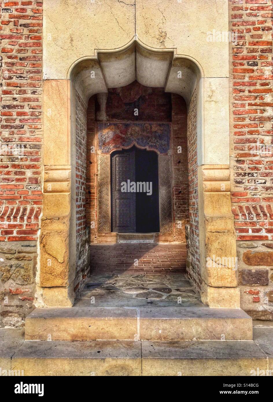 Brick wall entrance Stock Photo - Alamy