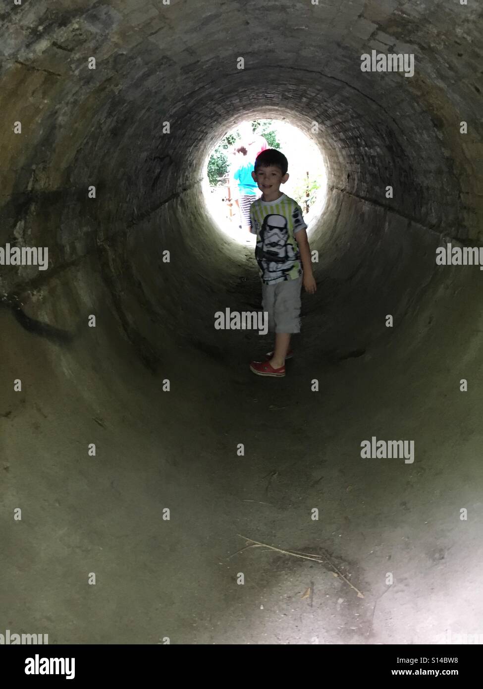 Boy in tunnel Stock Photo Alamy