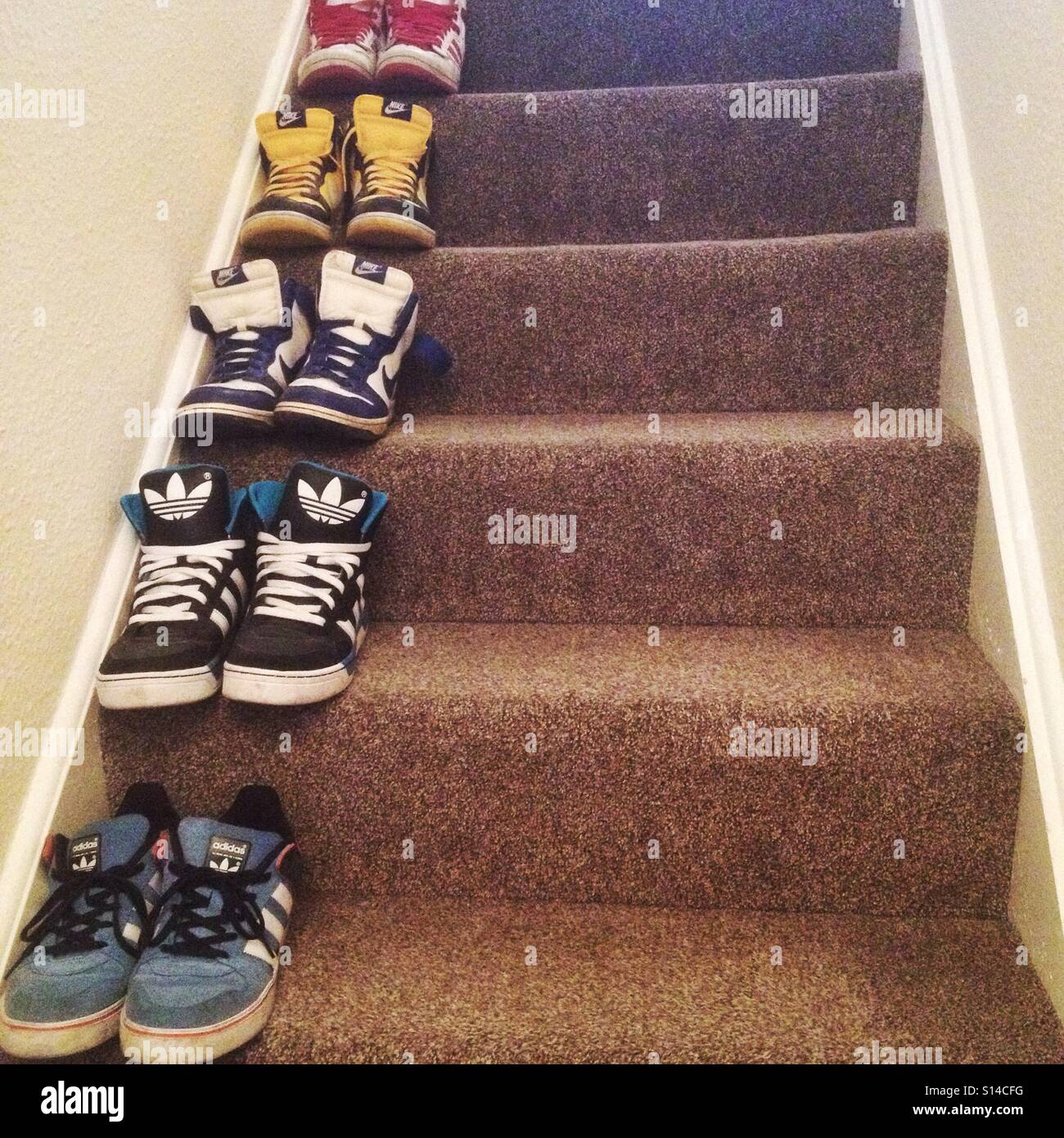 Trainers on the stairs. Stock Photo