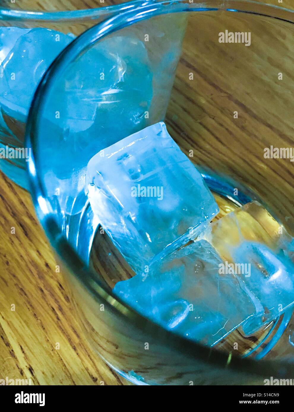 Blue ice cubes in a glass Stock Photo