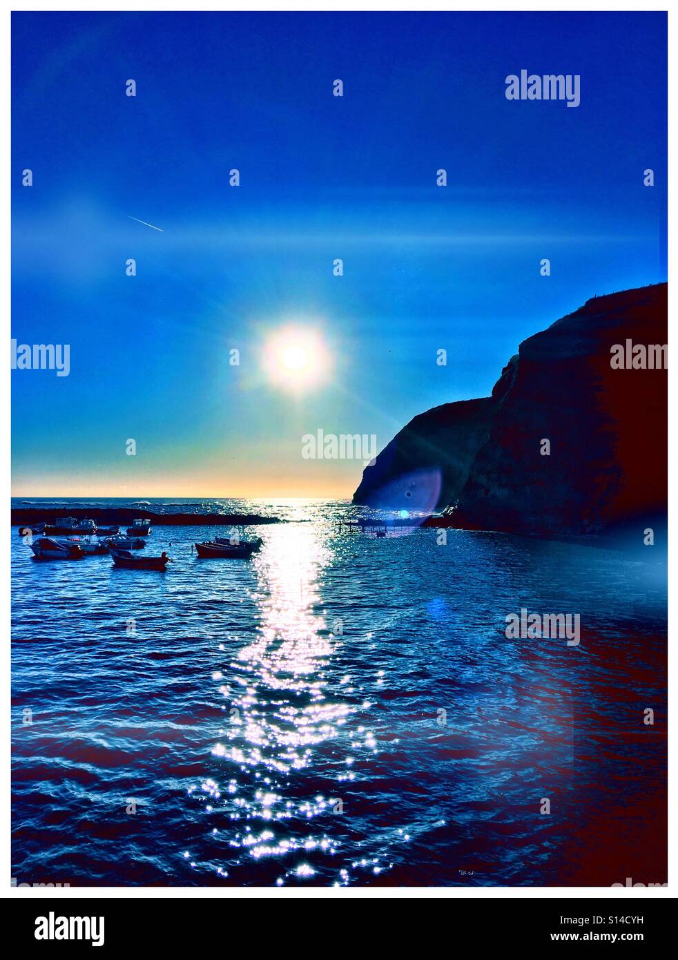 Blue sunrise over the bay Stock Photo