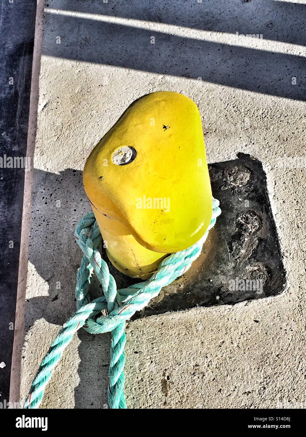 Bollard with mooring line Stock Photo Alamy