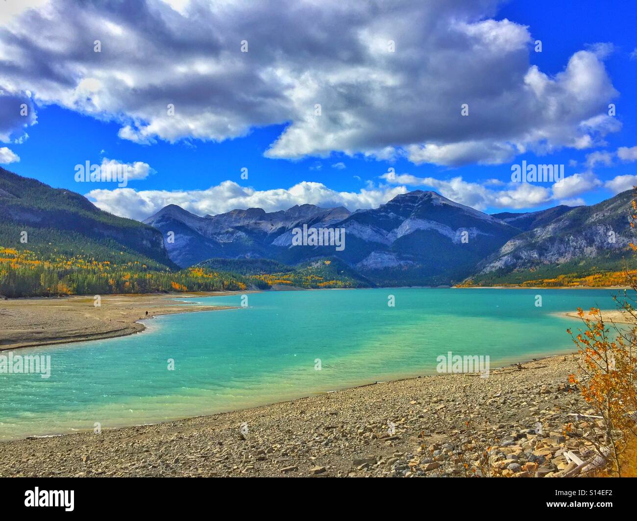 Mountain Lake.  Great Barrier Lake in Kananakis Country. Alberta, Canada.  Autumn colours. - Smartphone Captured Stock Image
