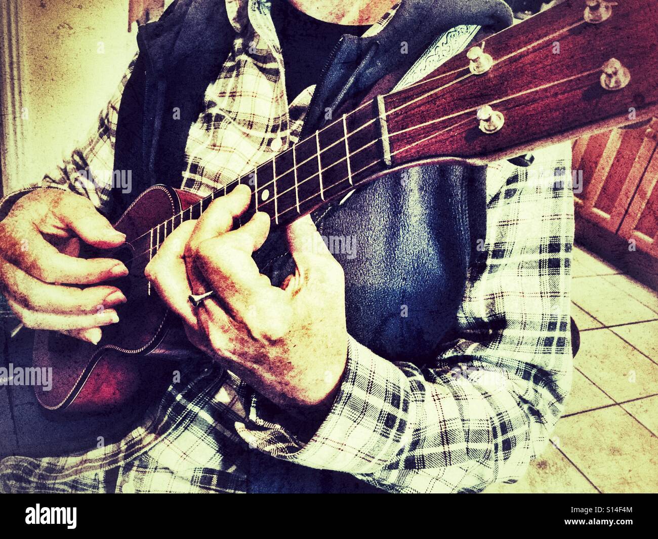 Woman playing ukulele - Smartphone Captured Stock Image