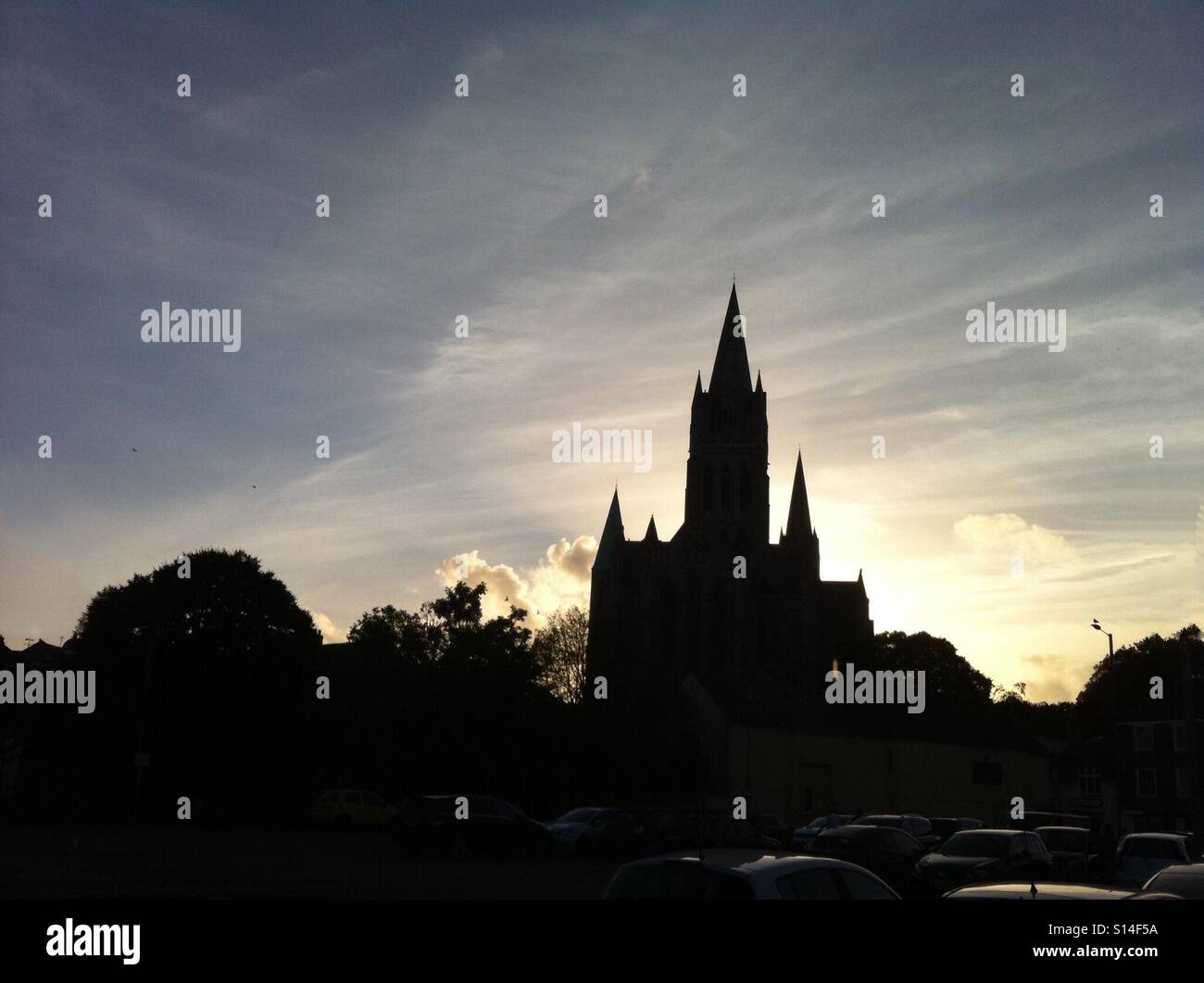 Truro Cathedral skyline silhouetted against the sky at dusk just after sunset. - Smartphone Captured Stock Image