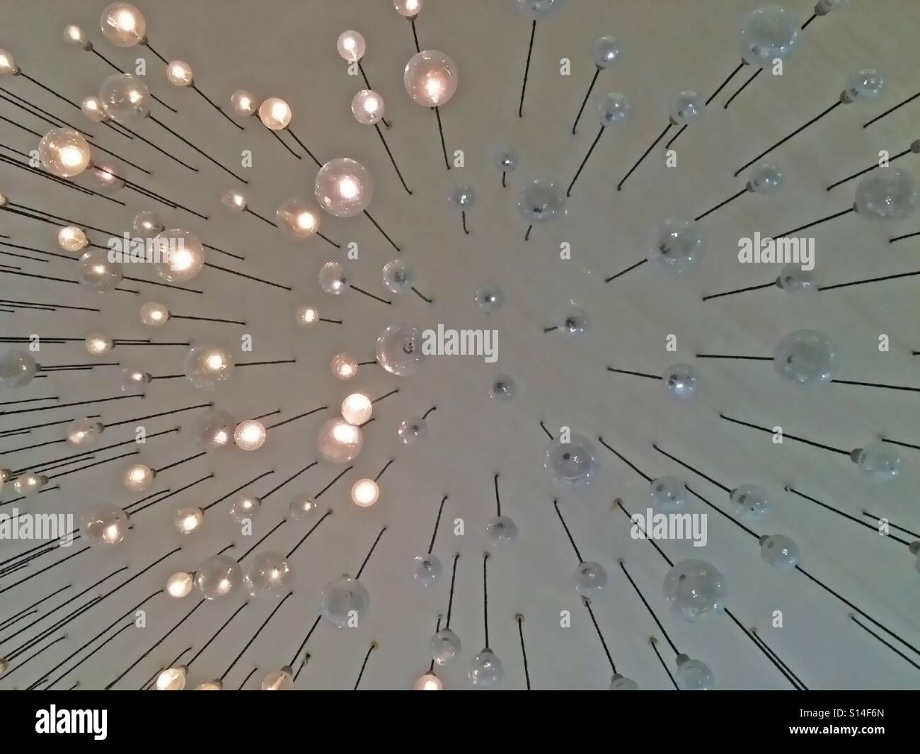 Blurry background of soft lit ceiling lamps - Smartphone Captured Stock Image