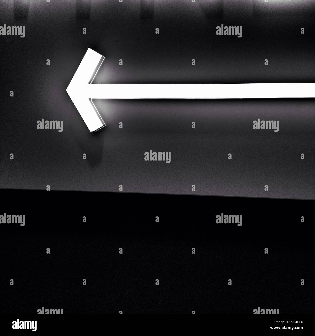 Neon arrow black and white - Smartphone Captured Stock Image