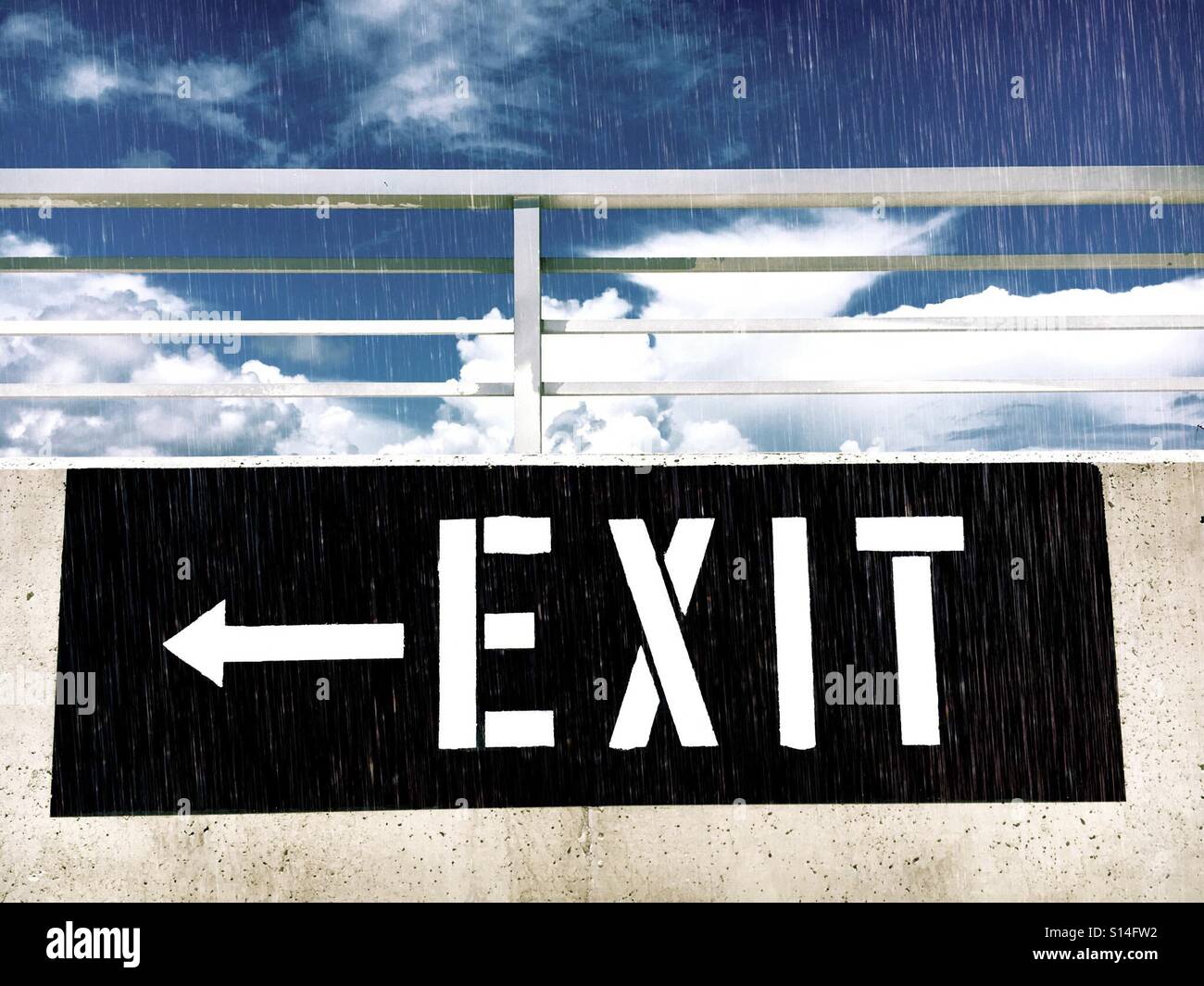 Exit sign at parking garage - Smartphone Captured Stock Image