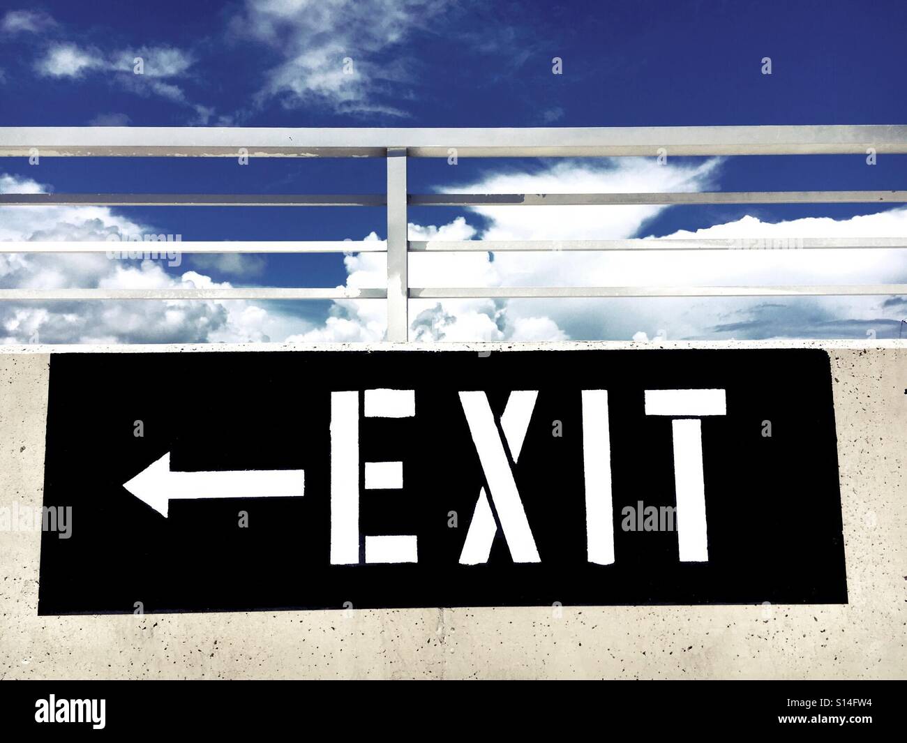 Exit sign at parking garage - Smartphone Captured Stock Image