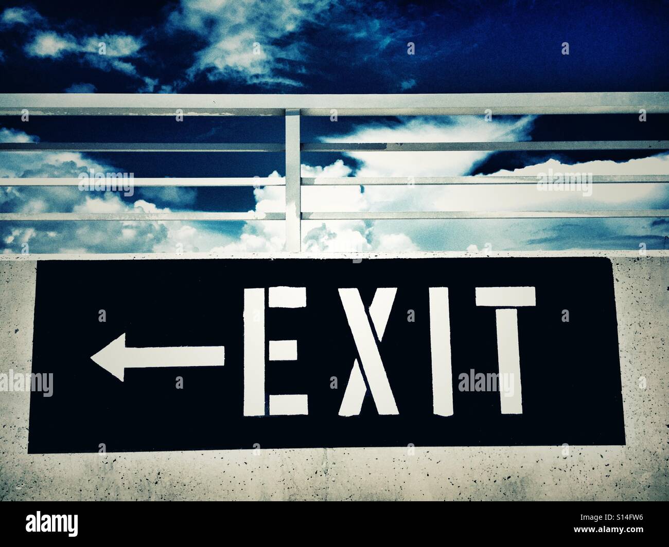 Exit sign at parking garage - Smartphone Captured Stock Image