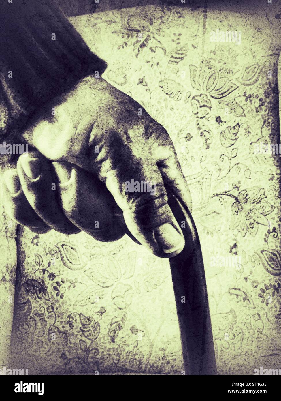 Pensioner with walking stick, close up of hand - Smartphone Captured Stock Image