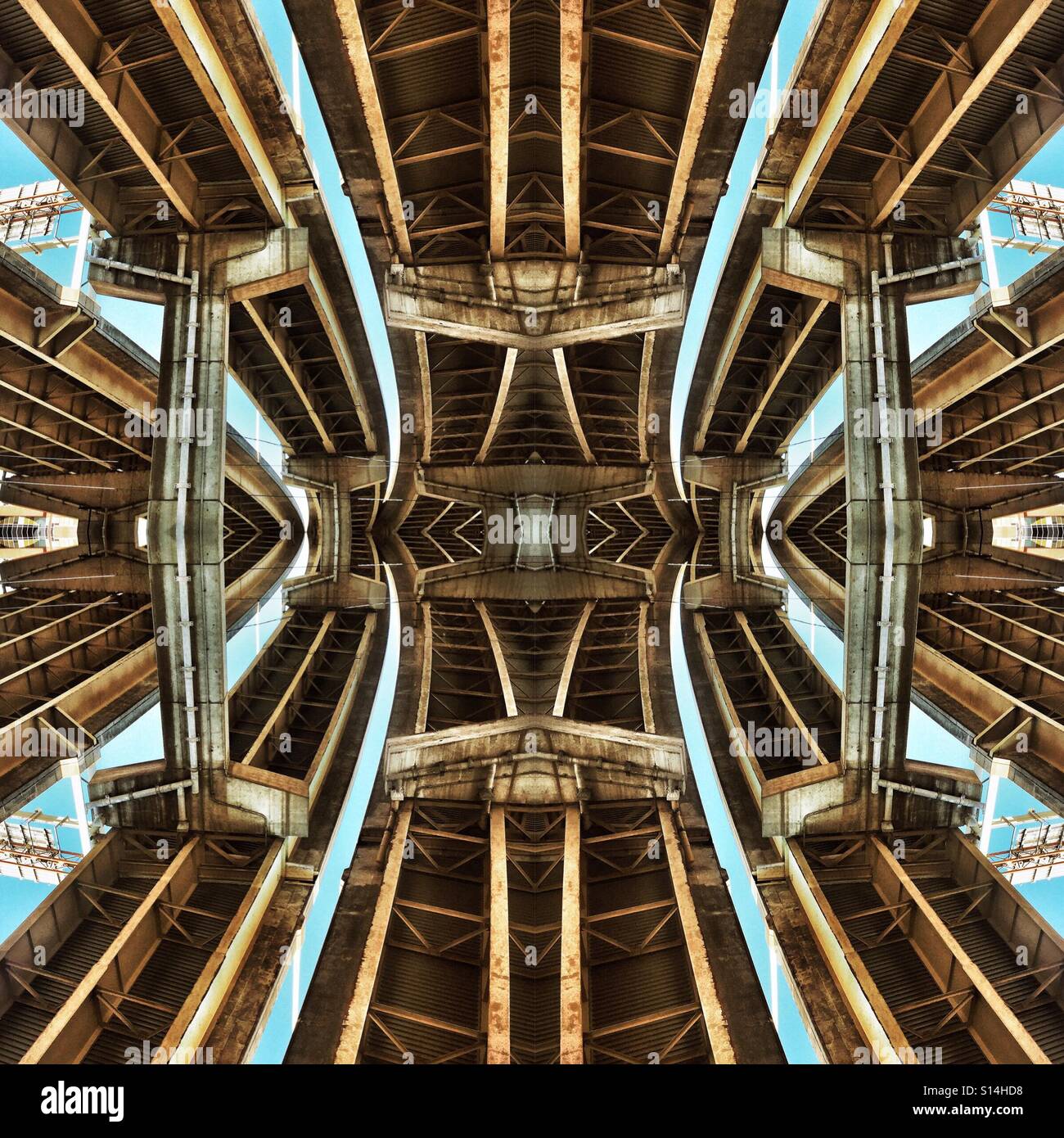 An abstract digital artwork featuring the underside of multiple highway bridges converging together - Smartphone Captured Stock Image