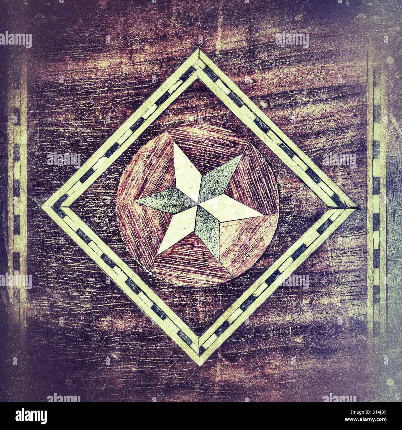 Marquetry inlay on an antique backgammon board. - Smartphone Captured Stock Image