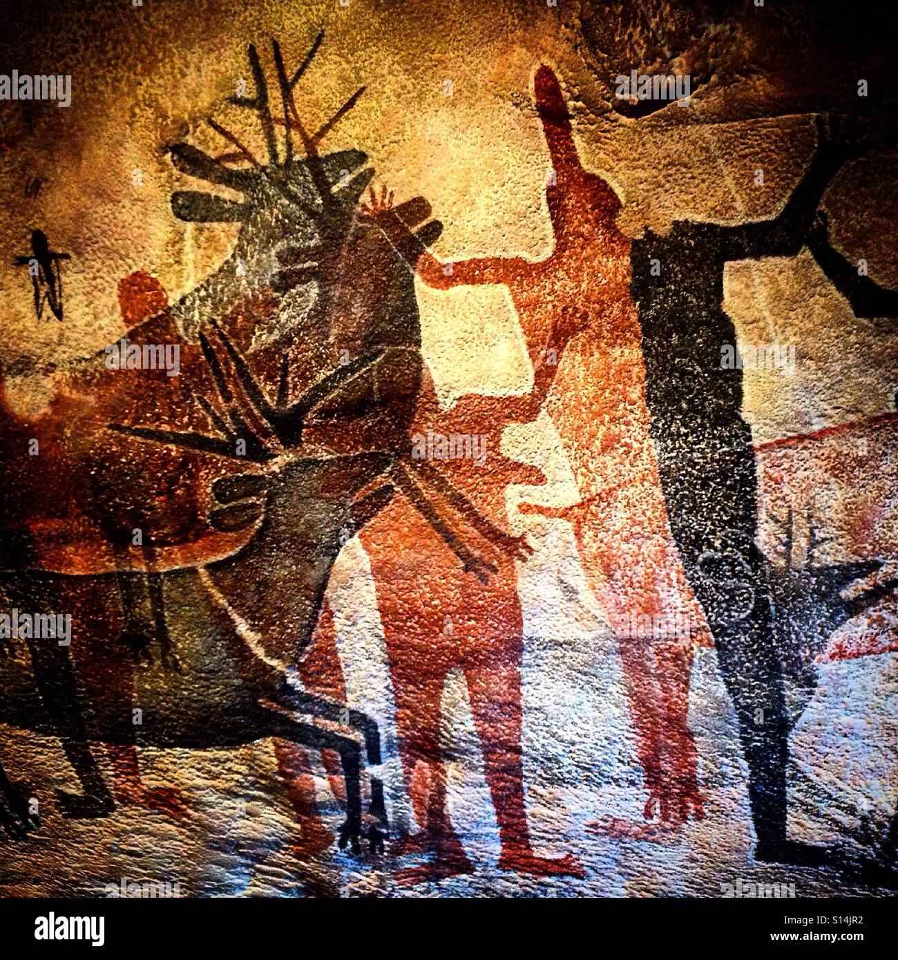 A reproduction of the deer and black&red men from the caves of the San Francisco Sierra in Baja California is displayed in Museo Nacional de Antropologia museum in Mexico City, Mexico Stock Photo