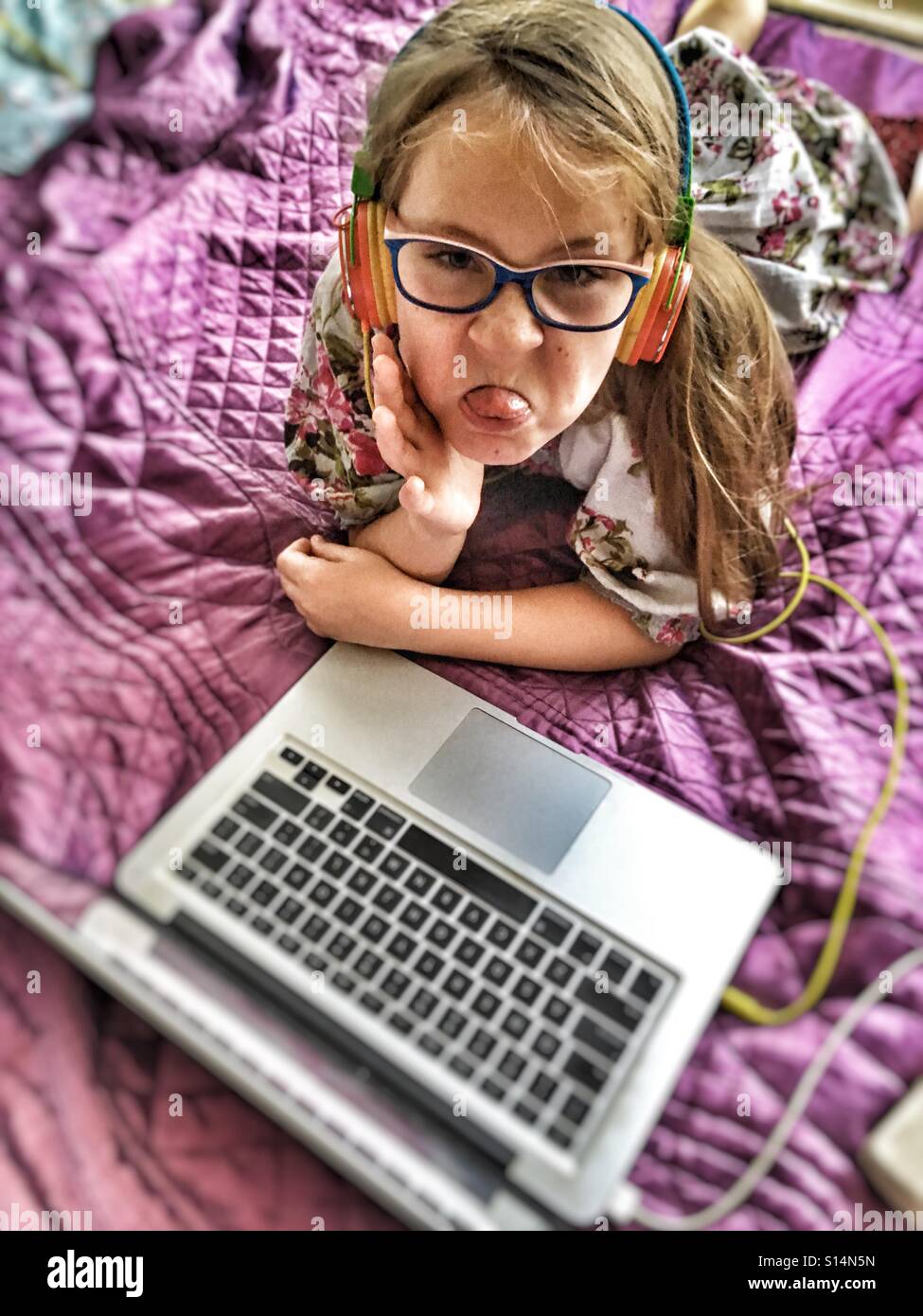 Girl poking her tongue. - Smartphone Captured Stock Image