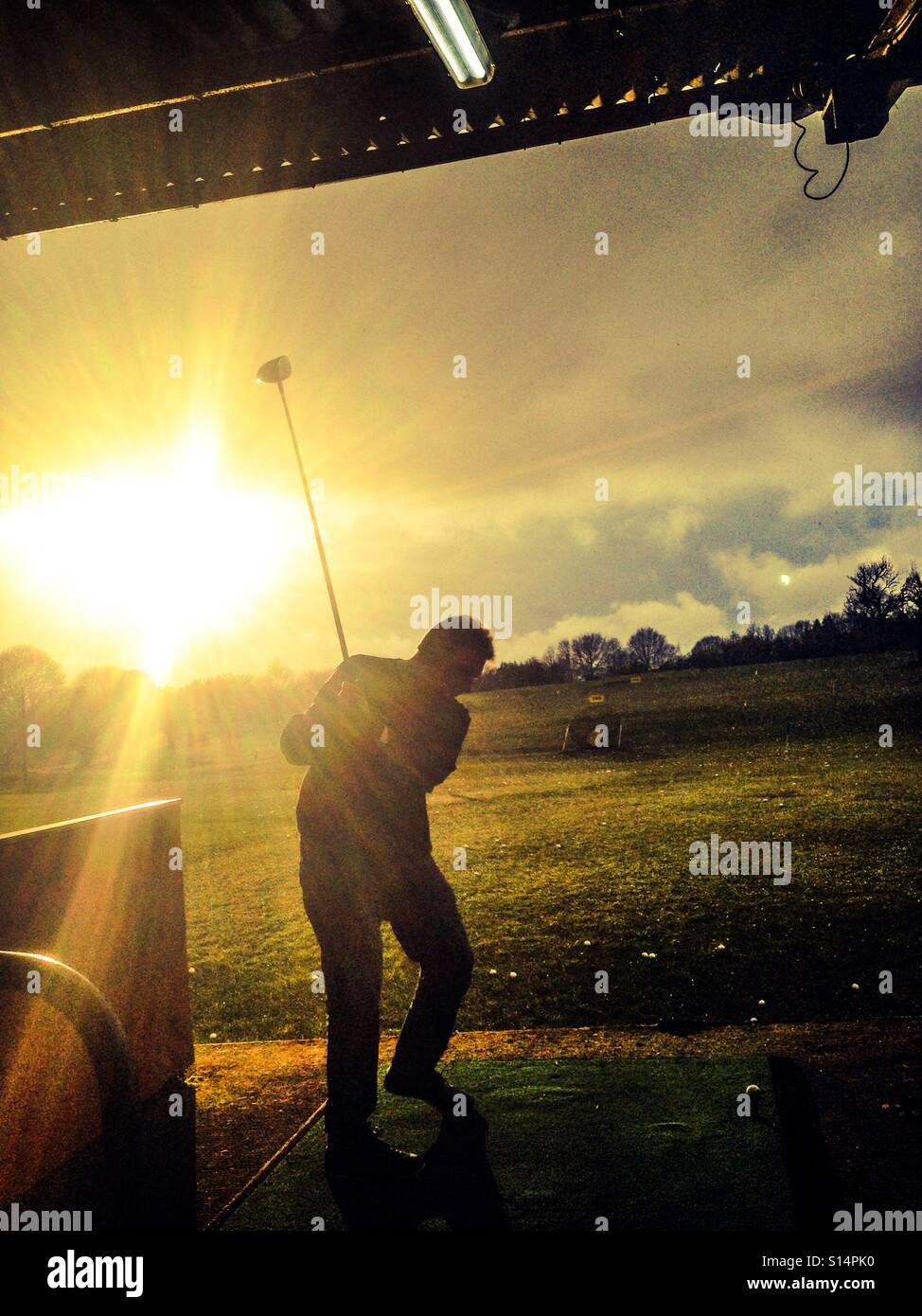Driving range afternoon Stock Photo Alamy