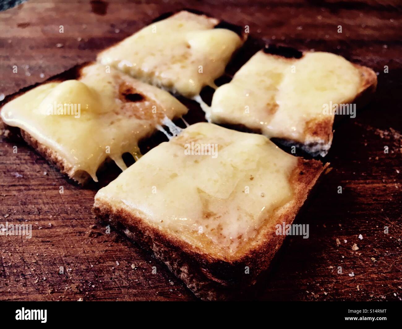 Melted cheese on toast Stock Photo Alamy