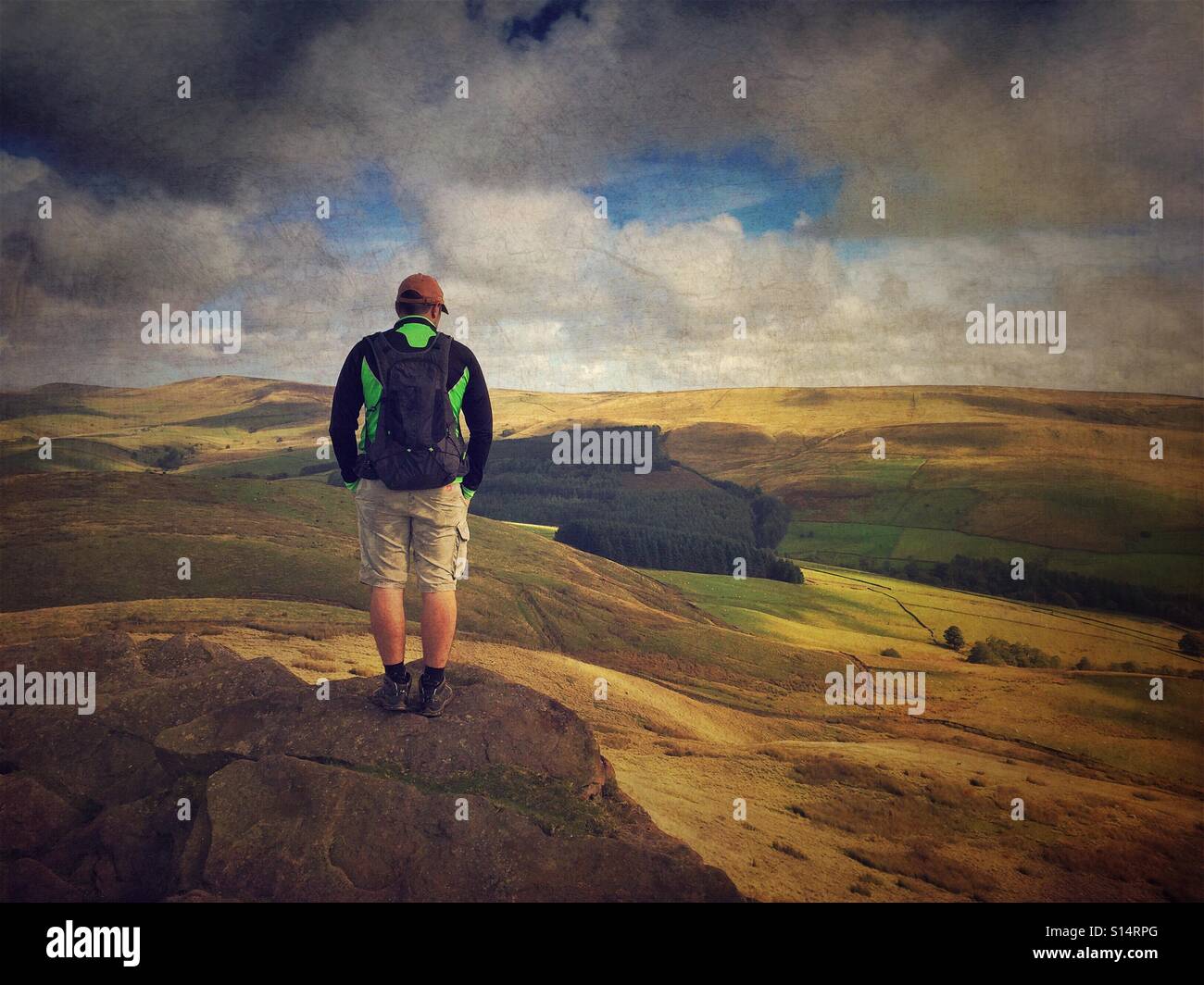 Hiker on the top of a hill - Shutlingsloe, Cheshire, UK - Smartphone Captured Stock Image