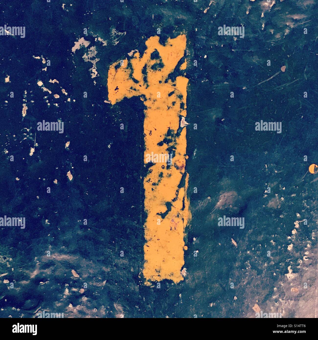 Number 1 painted in Yellow color - Smartphone Captured Stock Image